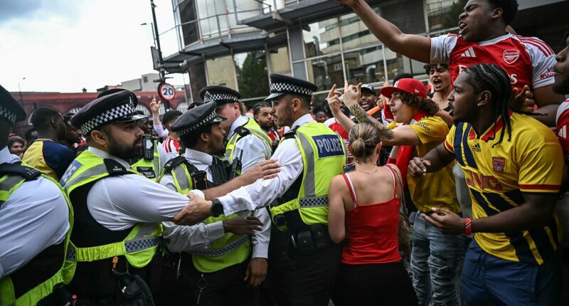 Nine people are arrested at Premier League title parade in north London as chaos erupts following Champions League defeat