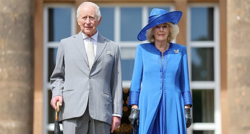 Party time! Charles and Camilla round off their visit to Northern Ireland with a garden party at Hillsborough Castle