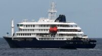 Passengers disembark from cruise ship at center of hantavirus outbreak in Spain