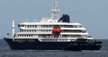 Passengers disembark from cruise ship at center of hantavirus outbreak in Spain