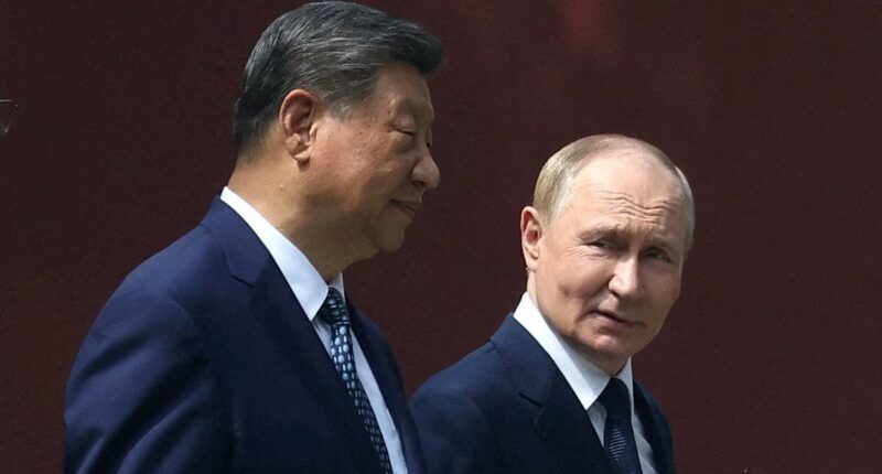 Putin arrives in China for talks with 'long-time friend' President Xi