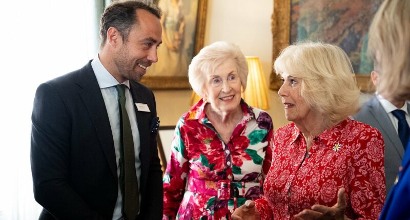 Queen Camilla bonds with Kate's dog-loving brother James Middleton at special Clarence House reception honouring life-saving pooches