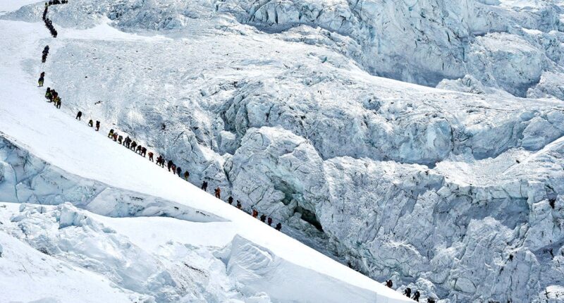 Record number of climbers summit Mount Everest from Nepali side despite overcrowding concerns