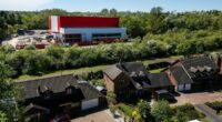 Resident fury as warehouse overshadows homes - and can't even be used