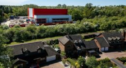 Resident fury as warehouse overshadows homes - and can't even be used