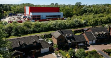 Resident fury as warehouse overshadows homes - and can't even be used