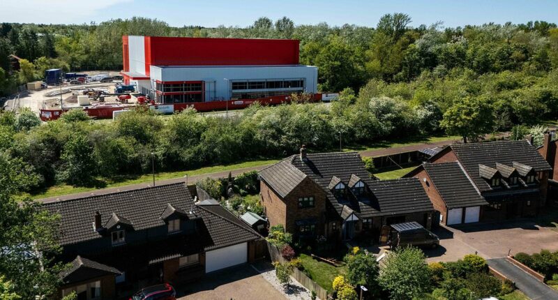 Resident fury as warehouse overshadows homes - and can't even be used