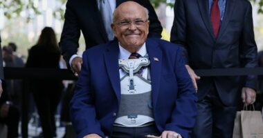 Rudy Giuliani 'alert and talking' as he fights back from grim diagnosis that left him hospitalized