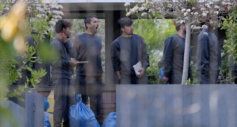 SUE REID: How 200,000th migrant to arrive was in hotel hours later
