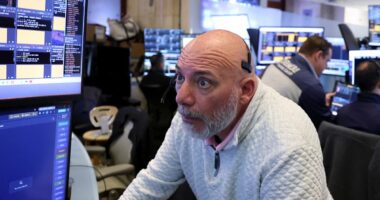 Strong April jobs report shocks Wall Street as markets surge
