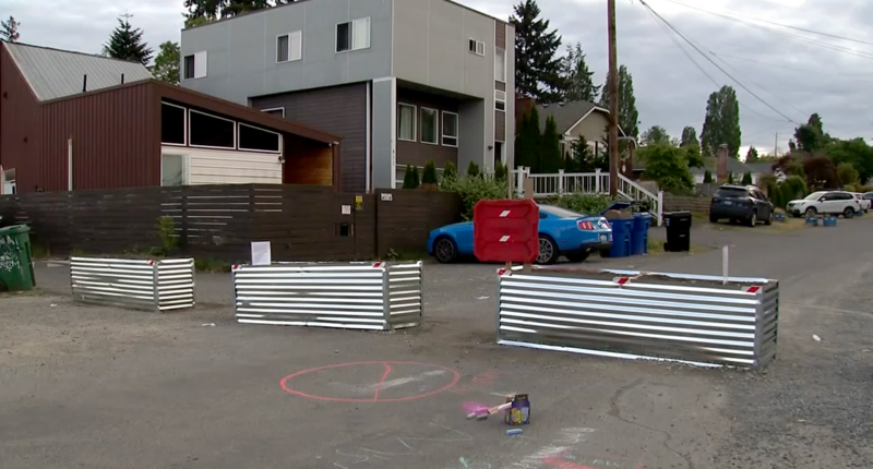 Terrified residents in crime-plagued blue city throw up giant barricades to stop chaos