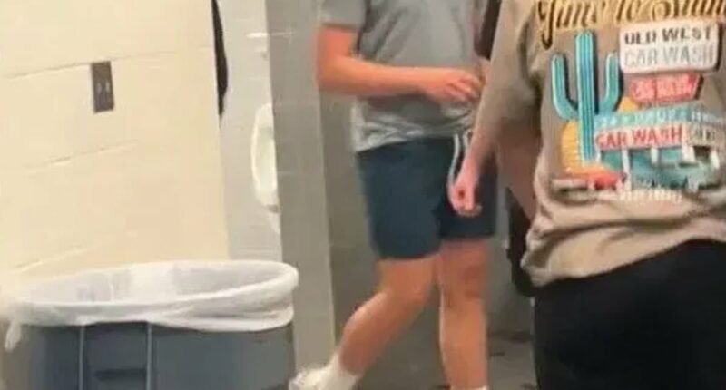Trans student accused of photographing students under bathroom stall