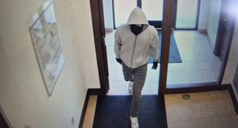 Two Kentucky bank employees shot and killed during robbery, police hunting suspect