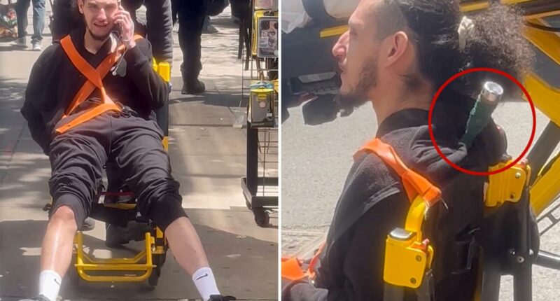 Wild video shows unfazed stabbing victim with object still lodged in back as NYPD hunts for suspects