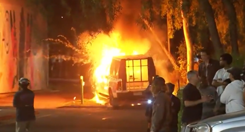 Woman accused of setting police car on fire during Alice Springs riot