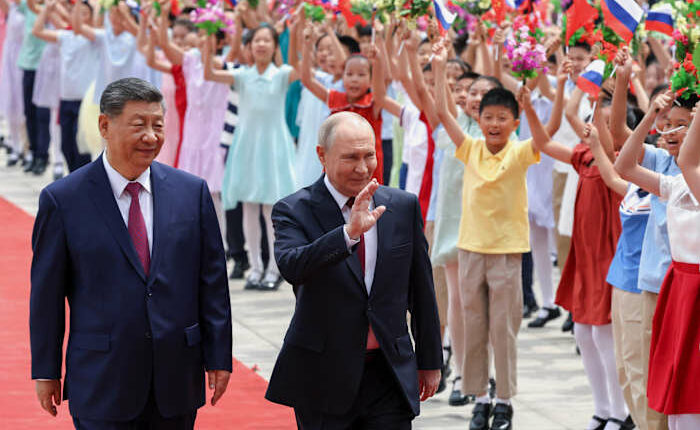 Xi and Putin highlight their friendship and cooperation on energy and other issues in Beijing visit