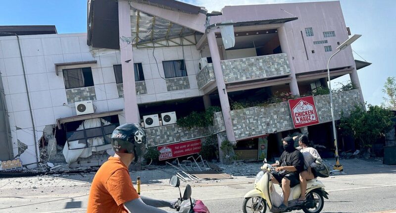 A 7.8 magnitude quake in the Philippines kills at least 32, collapses buildings and sparks tsunami