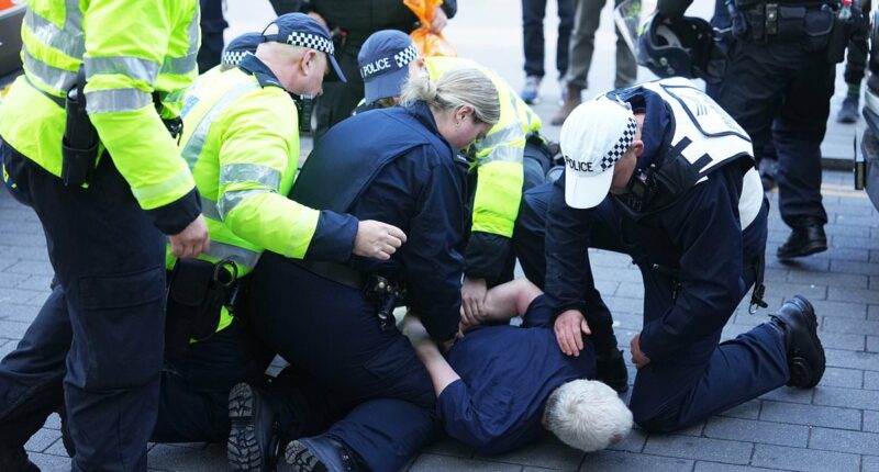Anti-immigrant protesters clash with counter-demonstrators across UK