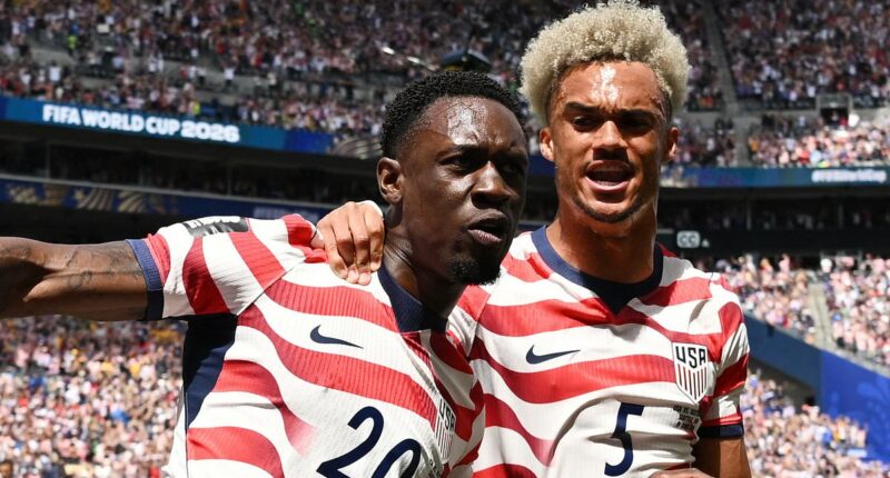 Dominant USA breeze past Australia to seal World Cup knockout spot