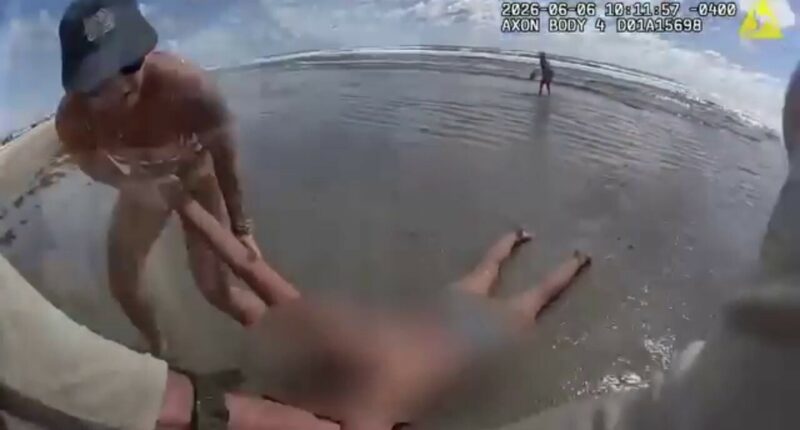 Florida deputy drags 'unresponsive' beachgoer from ocean in dramatic rescue