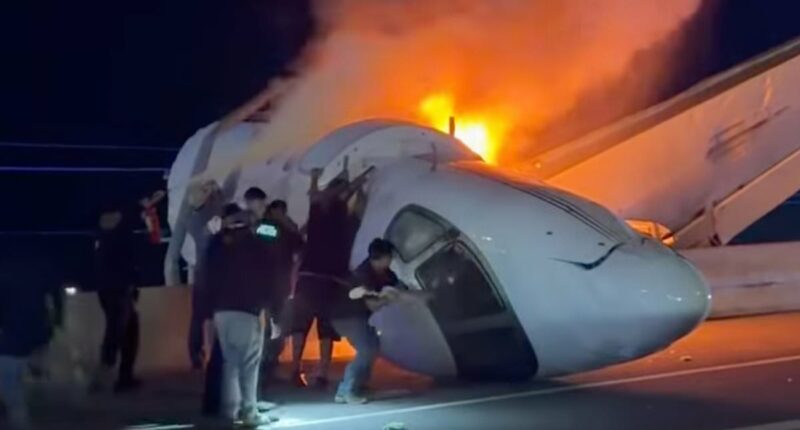 Footage shows moment fiery plane crashes and splits in two on highway