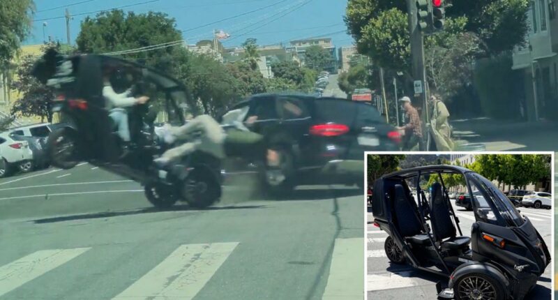 Graphic footage shows driver flung from three-wheeler after smashing into Audi at intersection