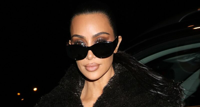 Kim Kardashian exudes glamour in a black faux-fur coat