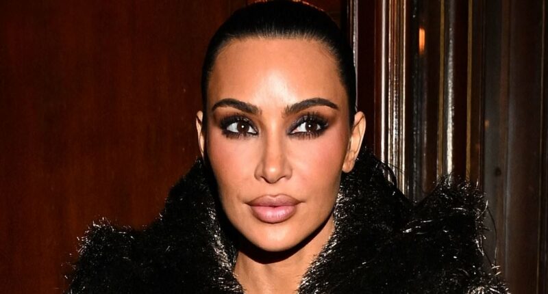 Kim Kardashian has her fingers in plaster as she leaves restaurant