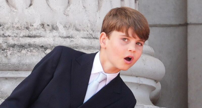 Louis steals the show on balcony - while George shows off his height
