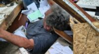 Man dragged alive from twisted tornado wreckage after deadly storms