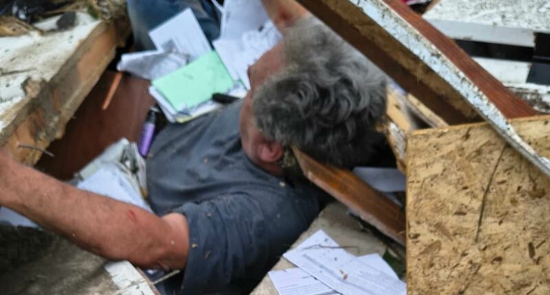 Man dragged alive from twisted tornado wreckage after deadly storms
