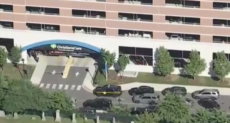 Manhunt underway as hospital employee shoots two coworkers in Delaware