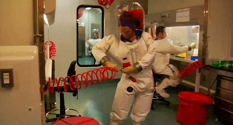 NIH scientists charged with attempting to smuggle viruses into US
