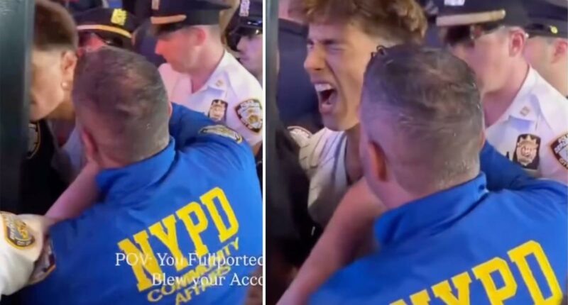 NYPD cop appears to slam Knicks fan head into pole during arrest at Madison Square Garden celebration: video