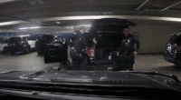 Pasadena Police Officer points gun at another officer then reholsters