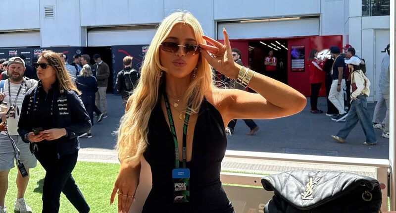 Phoebe Kay, 21, looks incredible in a plunging jumpsuit at the Montreal Grand Prix as she spends time in America after her parents split