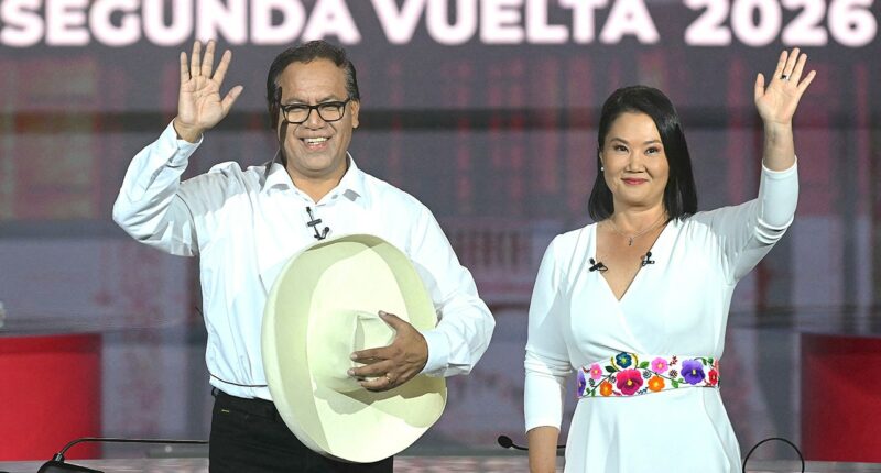 Pro-US conservative faces leftist in Peru's high-stakes presidential runoff