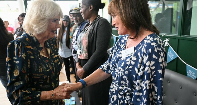 Queen Camilla reveals she 'always has a book in my bag' as she joins Lorraine Kelly for homeless charity visit to learn about innovative reading scheme