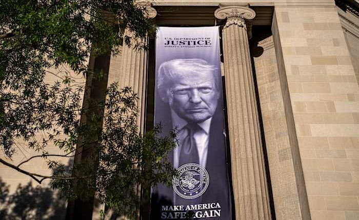 The Latest: Trump keeps immunity from tax probes while scrapping $1.8 billion compensation fund