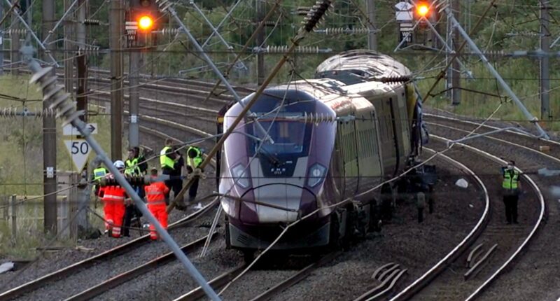 UK train crash: 2 trains collide north of London, near Bedford, England, killing at least 1 and injuring nearly 100