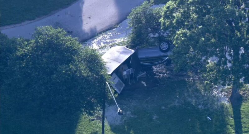 Car rolls over, crashes into shed off of DuSable Lake Shore Drive
