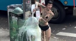 NYC dominatrix plastic wraps sub to pole and douses him in milk