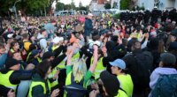 Tens of thousands of far-left protesters clash with police in anti-conservative party riots
