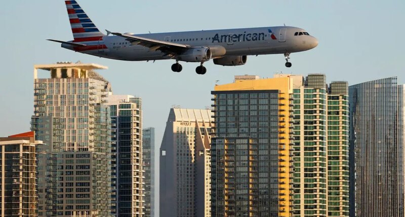American Airlines flight lands safely after laptop battery catches fire on board; passenger injured