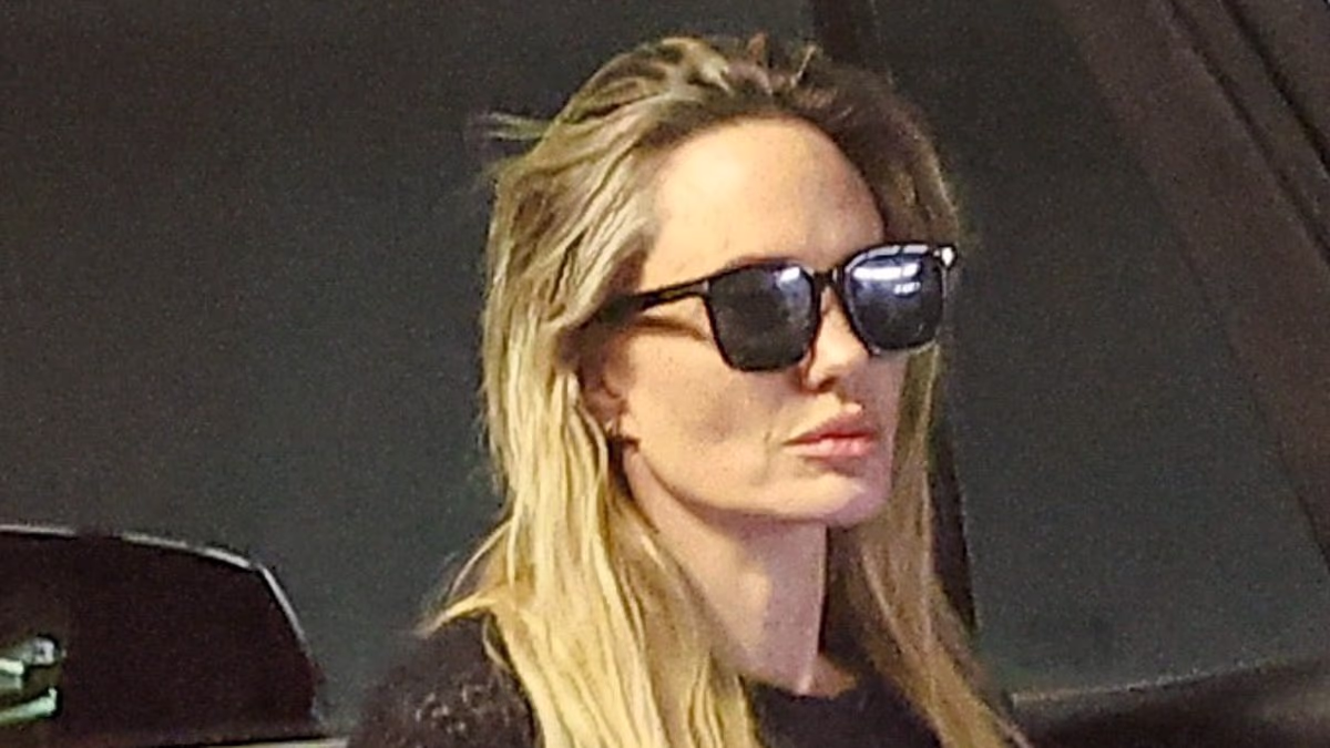 Angelina Jolie cuts a glum figure amid bitter Brad Pitt legal battle