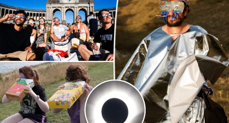 Europeans take in rare total eclipse as sunny holiday hotspots briefly turn to darkness: photos