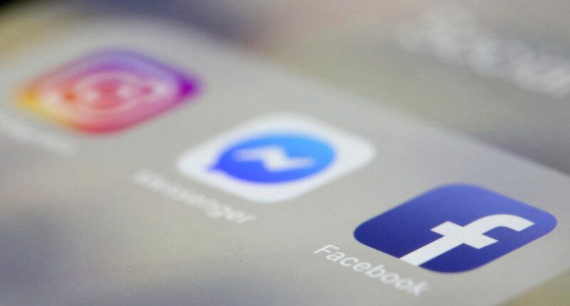 FILE – March 13, 2019, - Facebook, Messenger and Instagram apps are displayed on an iPhone, in New York. (AP Photo/Jenny Kane, File)