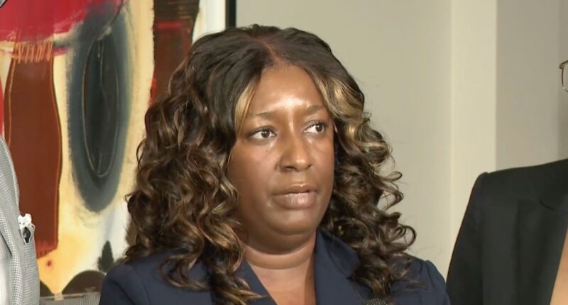 Cassandra Barksdale speaks to reporters about her lawsuit against Kaiser Permanente (WXIA).