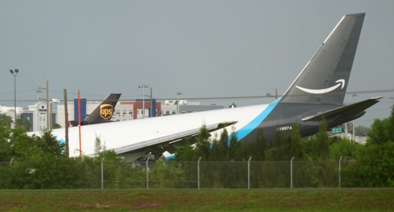 Amazon cargo plane sends up billowing cloud of smoke after overrunning runway at Miami airport
