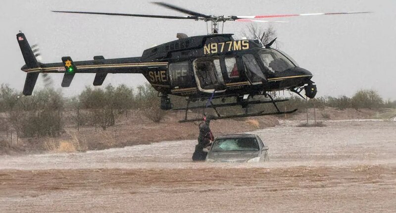 Arizona sheriff deploys helicopter to save 2 stranded in flooded car